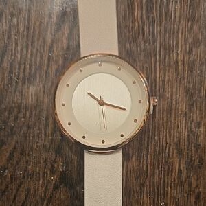 Elegant Beige Watch with Gold Accents